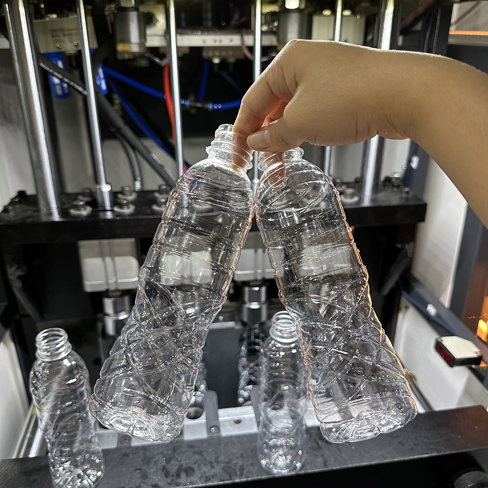 Technical Deep Dive: 4-Cavity Semi-Automatic PET Stretch Blow Molding Machine | TAIXIANG Machine